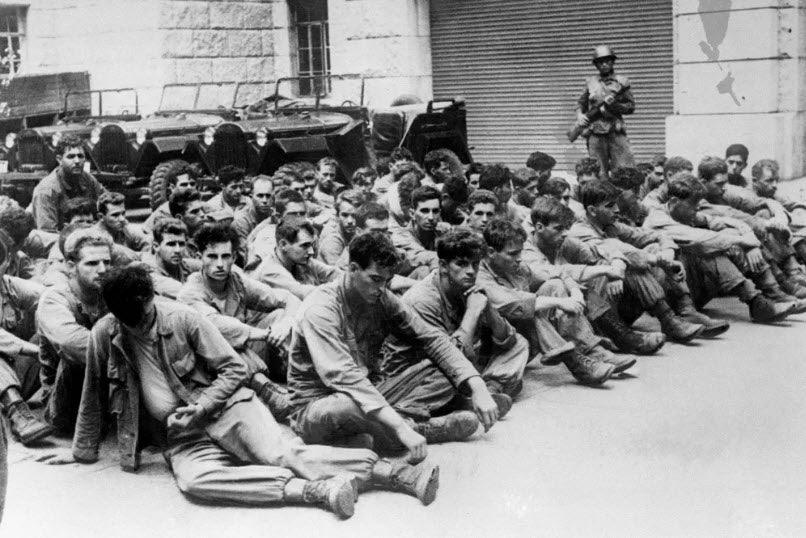 A photgraph of American POW's captured by North Korean forces await liberation at the 38th parallel on Oct. 5, 1950.