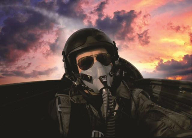 Military pilot making the transition from daylight to night light.