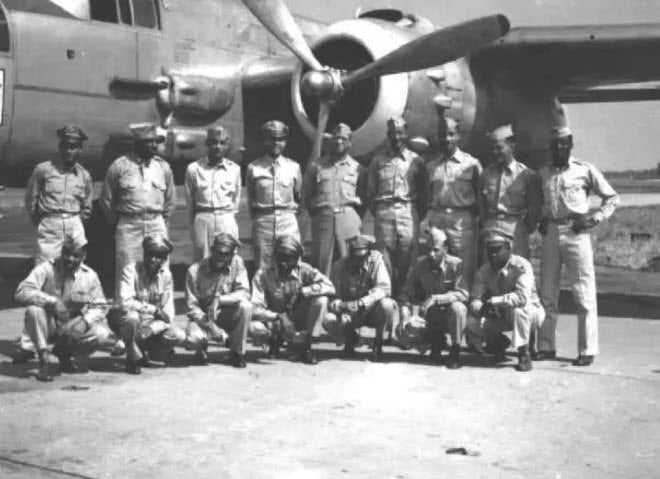 The Freeman Field Mutiny 477th Bomb Group members in front of a B-25