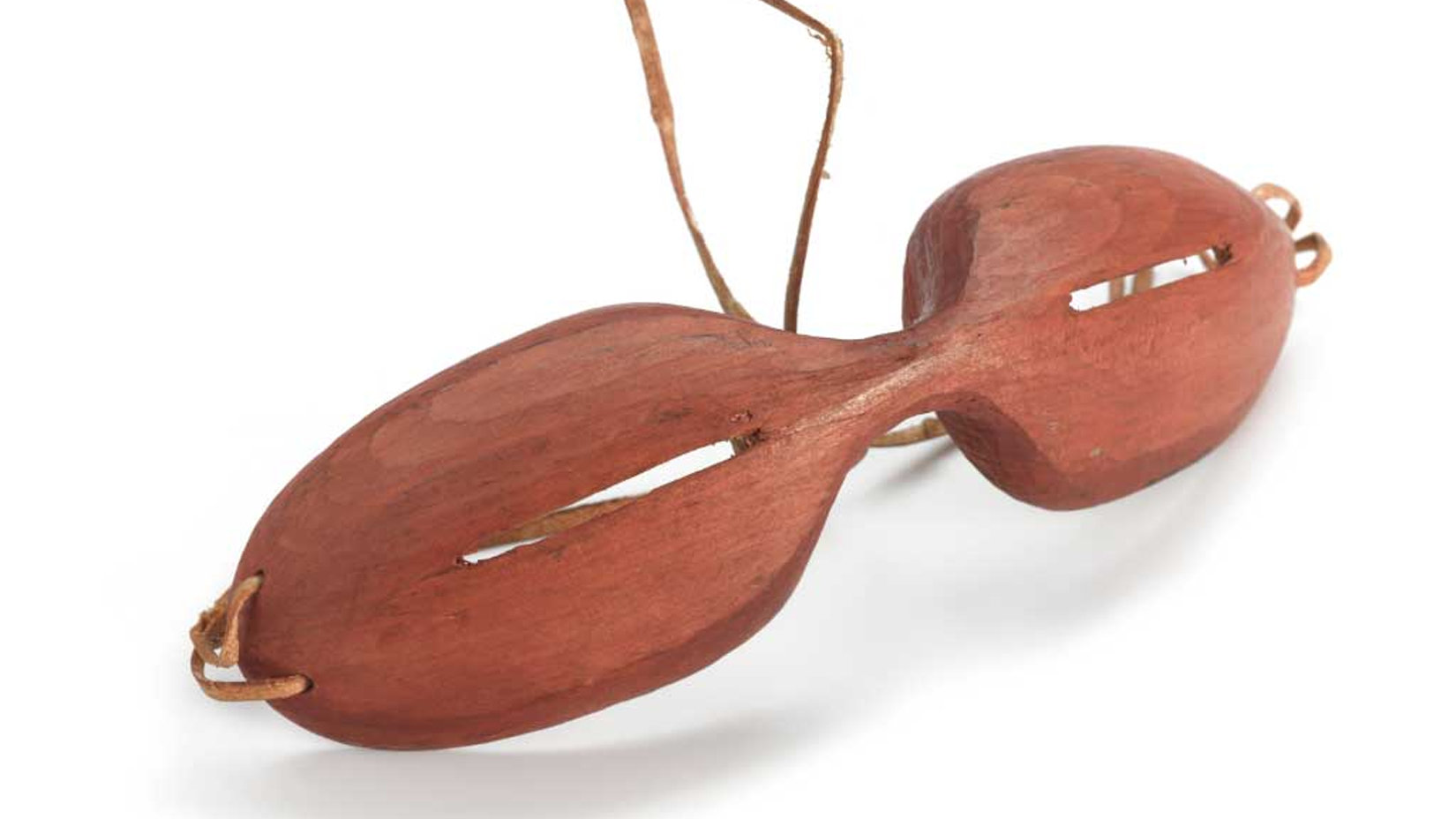 Early history time of origin glasses began ancient original evolution sunglasses started protection harmful eye injury damage protect eyes sun ray light sunlight suns rays the use of glass lenses wood and made of ruby emerald emeralds fashion