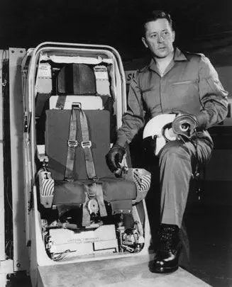Alvin S. White, North American Aviation Test Pilot, standing beside the XB-70 Valkyrie Escape Capsule