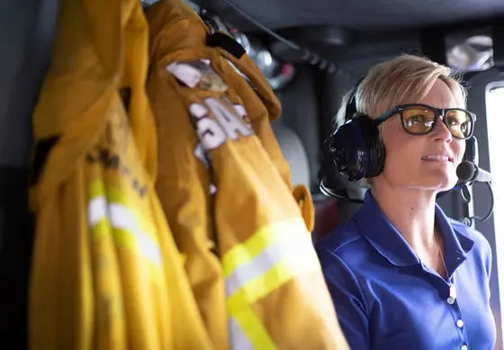 An image of a woman wearing a pair of Eagle Eyes Charlie Night Driving sunglasses.
