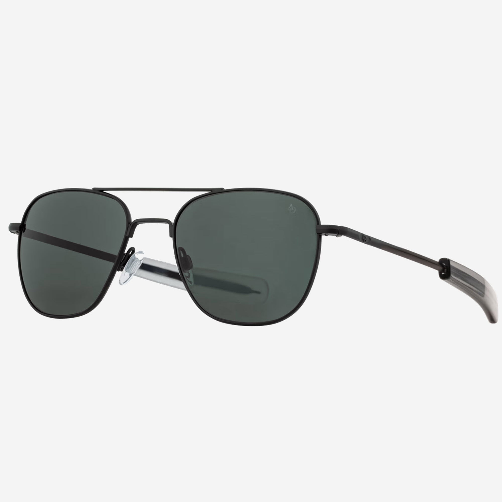 A pair of AO Original Pilot aviator sunglasses with a matte black metal frame and dark gray lenses, shown from a side angle.