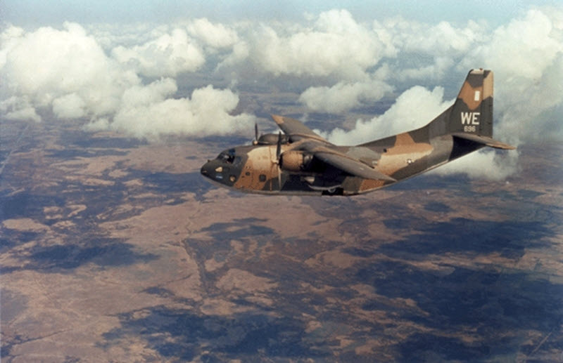 A photgraph of an ACS C-123K in flight over the Mekong Delta, Vietnam, 1969