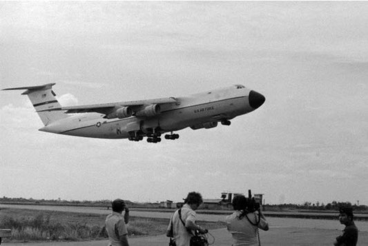 Operation Baby Lift Lockheed C-5A Galaxy 68-0218 lifts off from Tan Son Nhut Air Base, South Vietnam, 4 00 p.m., Friday, 4 April 1975.