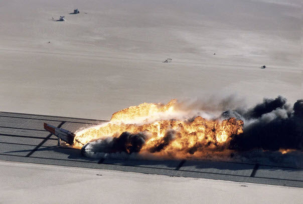 The flaming wreckage of NASA 833 Boeing 720 slides to a stop on Rogers Dry Lake.